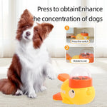 Interactive treat dispenser for cats and dogs in the shape of a yellow duck, durable plastic training toy